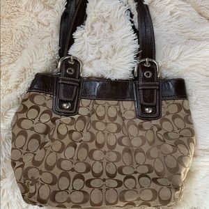 Coach handbag with brown trim